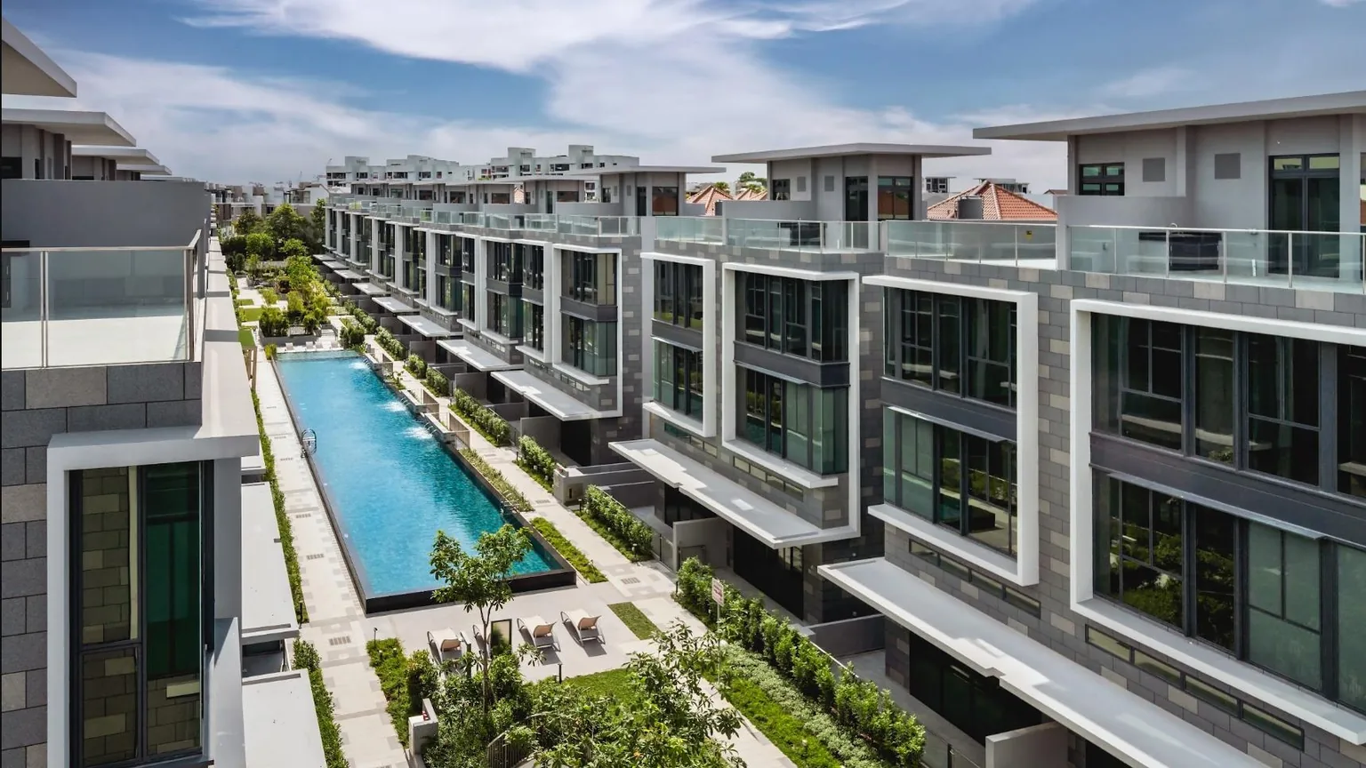 Belgravia Ace semi-detached houses lining the 50m lap pool at Belgravia Drive